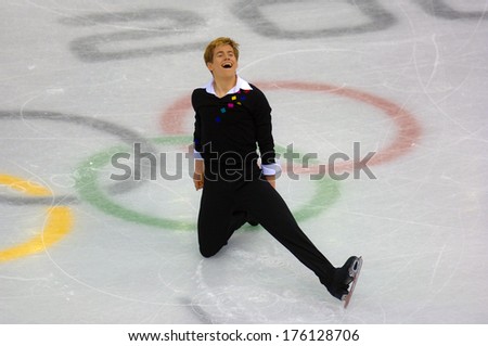 TURIN, ITALY-FEBRUARY 15, 2006: Jeffrey Buttle competes during the Individual Male Figure Ice Skating competition at the Winter Olympic Games of Turin 2006.