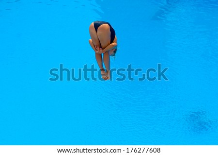 BUDAPEST, HUNGARY-AUGUST 01,2006: Professional diver woman diving into water during the European Swimming Championship in Budapest.