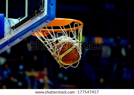 MILAN, ITALY-NOVEMBER 15, 2006: Basket ball enters the hoop during a professional match of the Italian Basketball League.