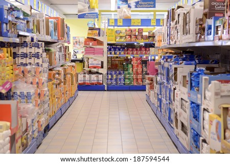 VARESE, ITALY-APRIL 11, 2014: Packaged food in a supermarket aisle, in Varese.