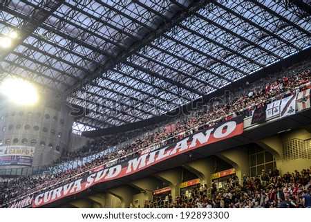 MILAN, ITALY-MAY 04, 2014: AC Milan soccer fans gathering at the San Siro stadium, during the Italian serie A soccer match, AC Milan vs FC internazionale, in Milan.