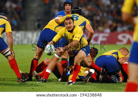 MARSEILLE, FRANCE-SEPTEMBER 13, 2007: Romanian Gabriel Brezoianu throwing the ball, during the rugby match Italy vs Romania, of the Rugby World Cup, in Marseille.