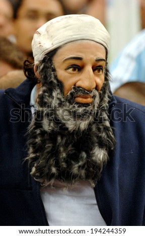 PARIS, FRANCE-OCTOBER 15, 2007: Argentinian supporter wearing a Bin Laden mask, before the rugby match Argentina vs South Africa of the Rugby World Cup, in Paris.