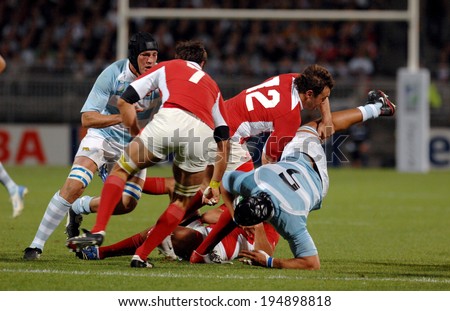 LYON, FRANCE-SEPTEMBER 12, 2007: rugby players scrum, during the rugby match Argentina vs Georgia, of the Rugby World Cup, France 2007, in Lyon.