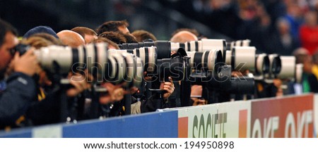 PARIS, FRANCE-OCTOBER 21, 2007: professional photographers lens are seen during the final England vs South Africa, of the Rugby World Cup, France 2007, in Paris