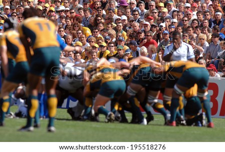 MONTPELLIER, FRANCE-SEPTEMBER 23, 2007: australian rugby players scrum during the match Australia vs Fiji, at the Rugby World Cup, France 2007, in Montpellier.