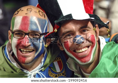 SAINT ETIENNE, FRANCE-SEPTEMBER 30, 2007: italian fans with national flag masked face, during the Rugby World Cup match Italy vs Scotland, in Saint Etienne.