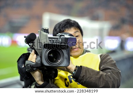 MILAN, ITALY-NOVEMBER 02, 2014: cameraman at work  during the italian serie A soccer match AC Milan vs Palermo, at the san siro stadium, in Milan.