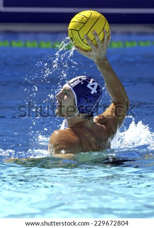 BARCELONA, SPAIN-JULY 16, 2003: italian water polo player Fabrizio Buonocore in action during the World Water Polo Championship, in Barcelona.