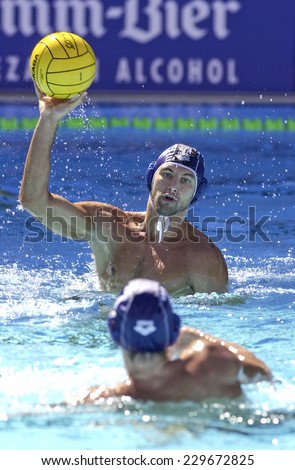 BARCELONA, SPAIN-JULY 16, 2003: italian water polo player Fabrizio Buonocore in action during the World Water Polo Championship, in Barcelona.