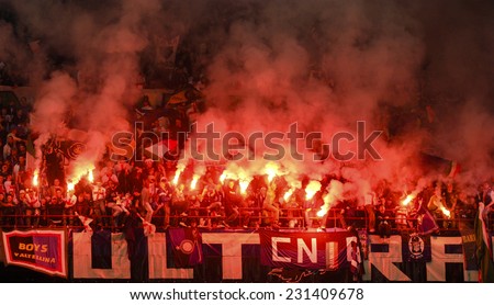 MILAN, ITALY-MAY 18, 2008: FC Internazionale fans light  smoke bombs at the san siro stadium, in Milan.