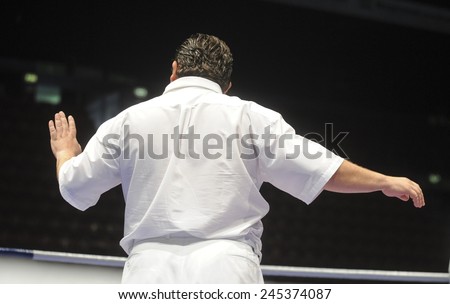 MILAN, ITALY-SEPTEMBER 05, 2009: referee back , during the amateur world boxing championship, in Milan.
