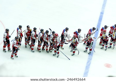 MALMO, SWEDEN-FEBRUARY 20, 2008: ice hockey players fair play at the end of the match at the hockey arena, in Malmo.
