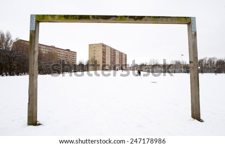 MALMO, SWEDEN-FEBRUARY 20, 2008: soccer playground field covered by snow with  building houses project, in Malmo.