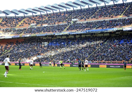 MILAN, ITALY-JANUARY 25, 2015: soccer stadium fans gathering at the san siro stadium for the serie A match FC Internazionale vs Torino, in Milan.