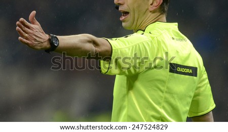 MILAN, ITALY-JANUARY 21, 2015: soccer referee gestures at the san siro stadium for the serie A match FC Internazionale vs Sampdoria, in Milan.
