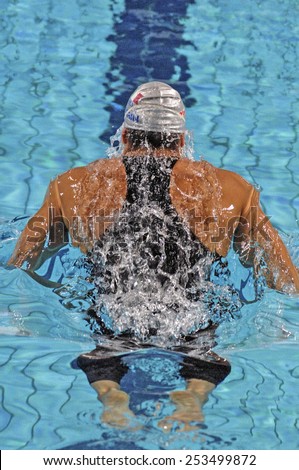 EINDHOVEN, HOLLAND-MARCH 22, 2008: male swimmer shoulder back during a back stroke race of the European Swimming Championship, in Eindhoven.