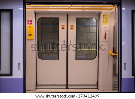 MILAN, ITALY-APRIL 27, 2015: metro train automatic door of the new lilac line number 5, in Milan.