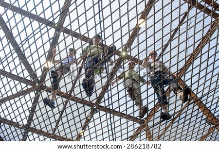 MILAN, ITALY-JUNE 05, 2015: visitors walking on the Brazil pavillion elastic rubber pavement at EXPO 2015, in Milan.