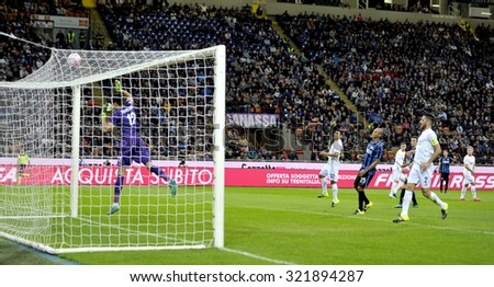 MILAN, ITALY-SEPTEMBER 27, 2015: soccer players in action during the italian soccer match FC Internazionale vs Fiorentina, at san siro stadium, in Milan.