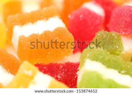 Background of different fruit-paste candies.