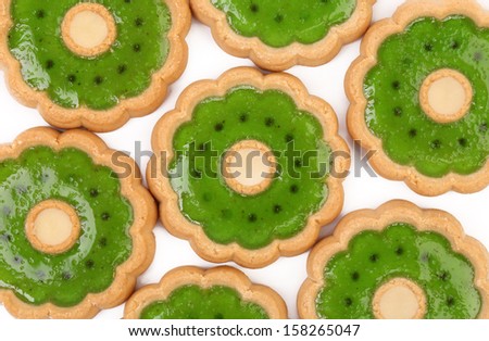 Biscuits with kiwi jam. Close up. Whole background.