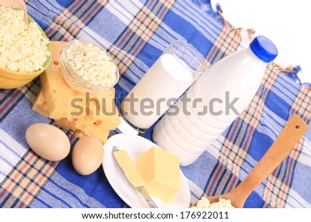 close up of Composition with bread milk and cheese. Isolated on white background.