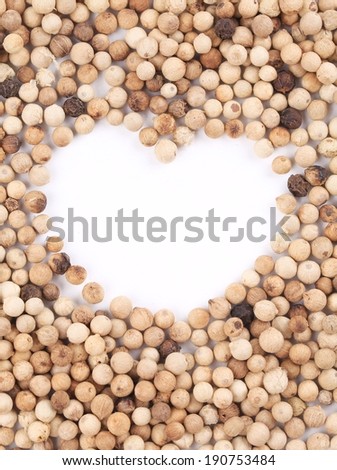 Heart in white pepper. To be used as background.