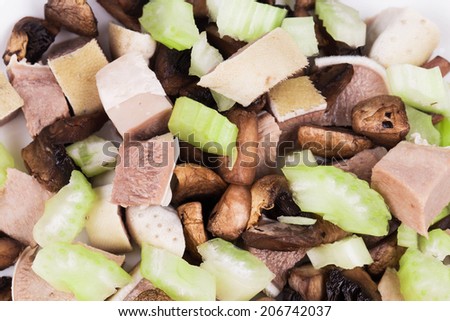 Delicious salad with beef tongue in the closeup isolated