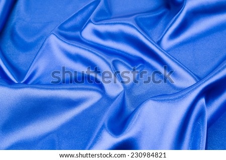 Blue silk background. Close up. Whole background.