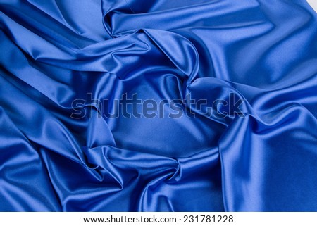 Blue silk heart background. Close up. Whole background.