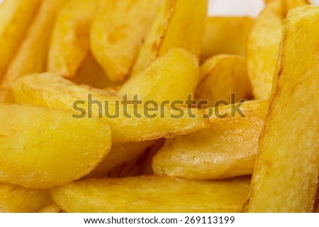 Delicious potato wedges with sauce. Fast food.  Macro. Can be used as a whole background.