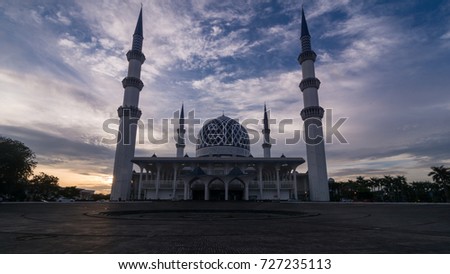 Islamic architecture building art of mosque. Scenery of sunset or dusk of Sultan Salahuddin Abd Aziz Shah Grand Mosque, Shah Alam