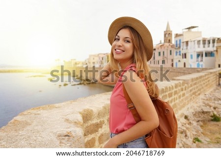 Similar – Image, Stock Photo Traveling woman walking along seashore
