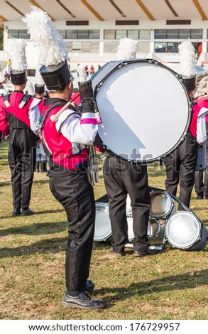 Drummer Playing A Bass Drum in Parade