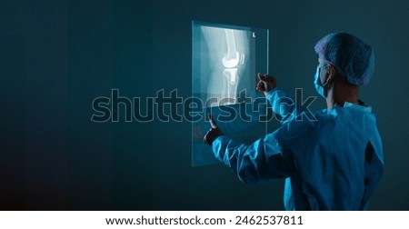 Similar – Image, Stock Photo Young doctor with x-ray film document on wall