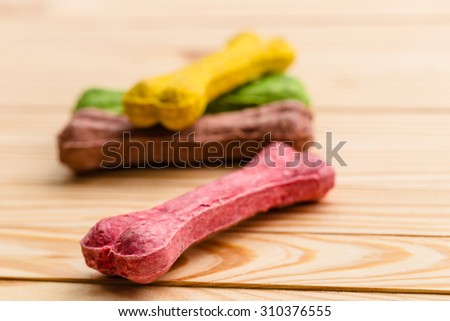 color of Dog Chew Bone on wooden