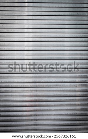 Similar – Image, Stock Photo An old weathered garage door. The blue and white paint is flaking off artfully.