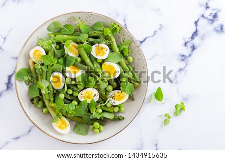 Similar – Image, Stock Photo Asparagus Salad with quails eggs and cheese crisps