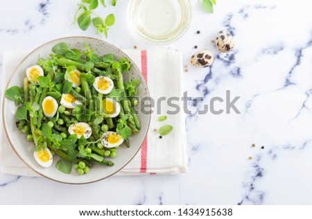 Similar – Image, Stock Photo Asparagus Salad with quails eggs and cheese crisps