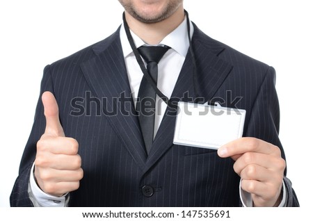 Young businessman with identification card isolated
