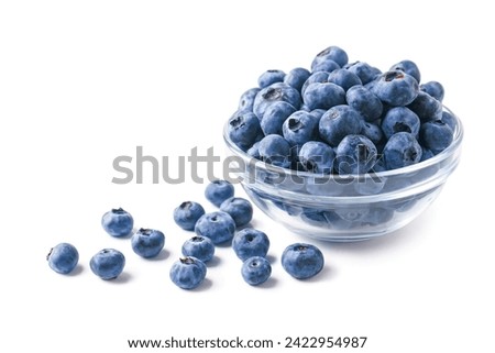Blueberries in a bowl on a wooden base
