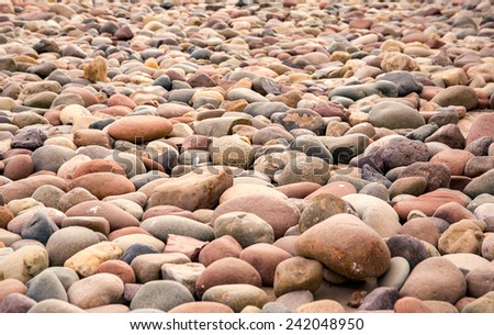 Closeup of river pebbles for use as background or texture