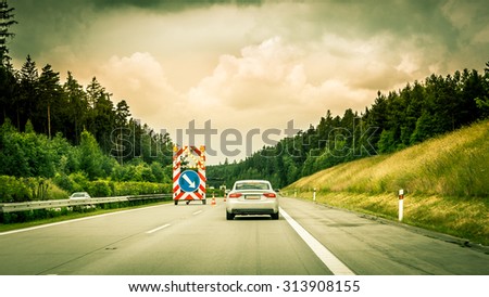 Rear view of a car driving an austrian motorway