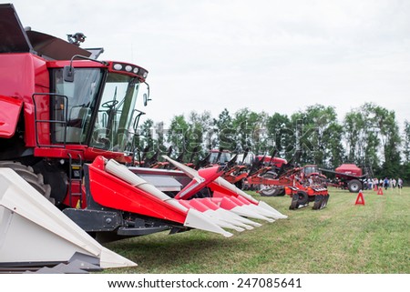red tractor in the field; exhibition tractors