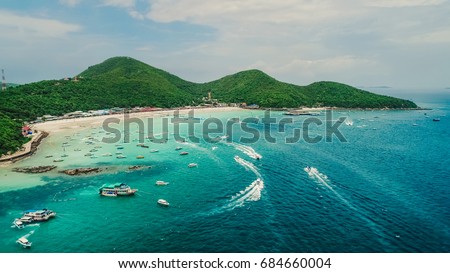 Speed boats driving tourists to Tawaen beach.Koh Larn island and his tropical beaches. Beautiful landscape of Thailand sea and boats.Crystal clear water. Pattaya city,Thailand.