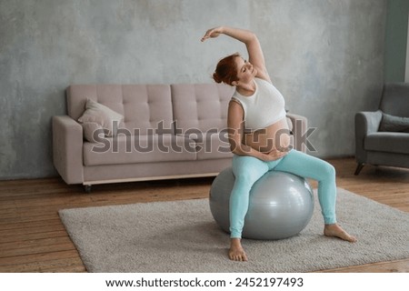 Similar – Image, Stock Photo Pregnant woman exercising with personal trainer