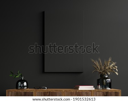 Mockup frame on cabinet in living room interior on empty dark wall background,3D rendering Сток-фото © 