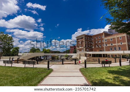 WINSTON-SALEM, NC, USA - JULY 15:Workers taking a lunch break at Winston Square Park on July 15, 2013 in Winston-Salem, NC, USA
