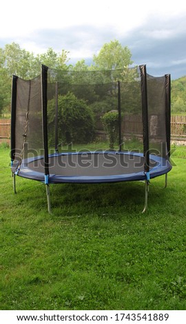 Similar – Image, Stock Photo Trampoline on a lawn in the sunset with two kids